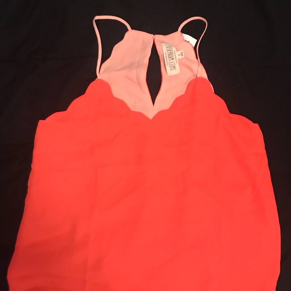 Scalloped tank